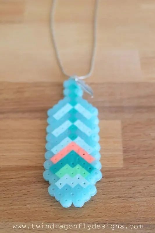 22 Fantastic Feather Crafts 2 1. Feather Perler Bead Necklace