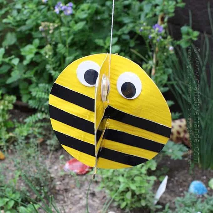 20 Easy Bee Crafts for Kids That Are Fun to Make 20 19 Duct Tape Twirling Bee Garden Decoration
