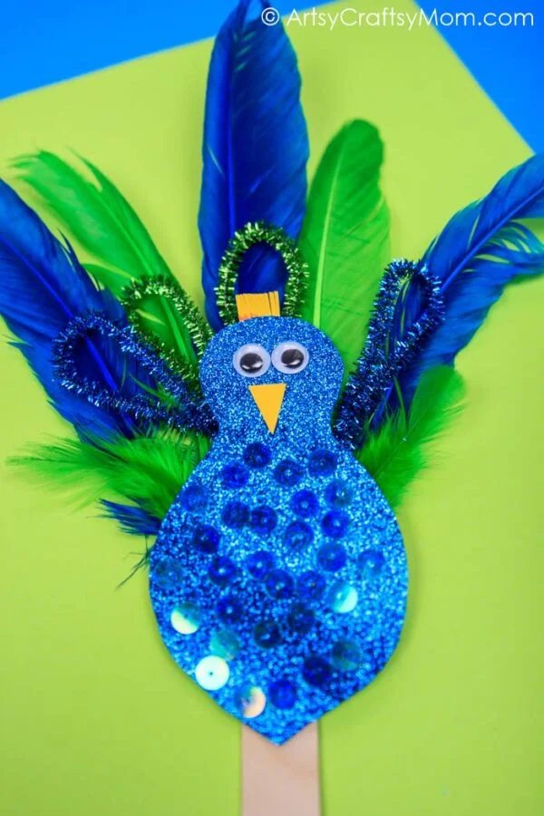 22 Fantastic Feather Crafts 5 4. Feather Peacock Craft