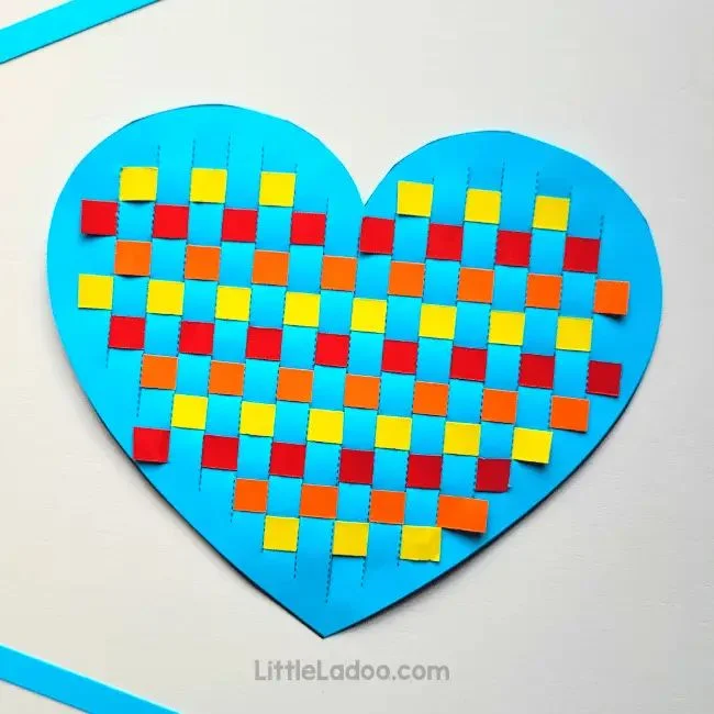 21 Exciting Paper Crafts for Kids 9 8. Paper Heart Weaving